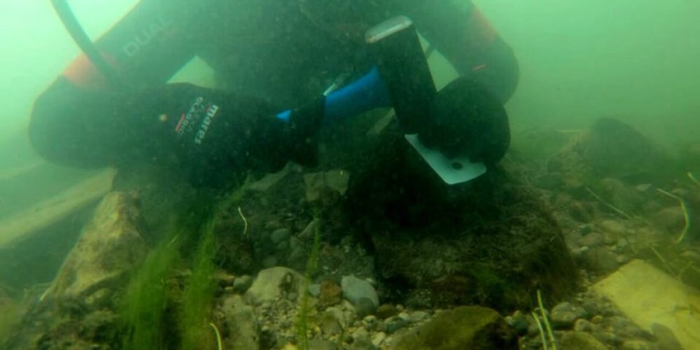 Bronze Age spearhead found in river by archaeologists