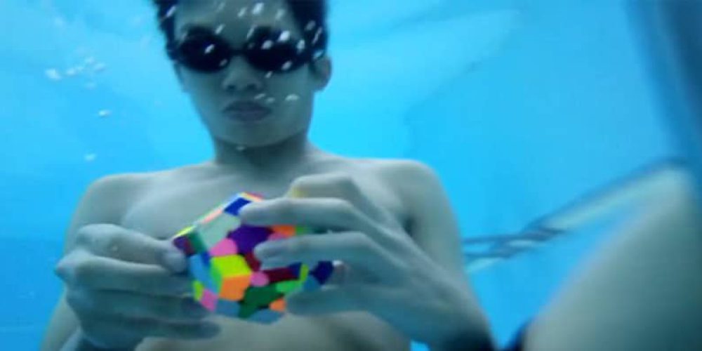 Malaysian boy stacked a 12-walled Rubik’s cube while holding his breath – video